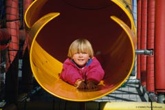 A boy on a playground; Size=240 pixels wide